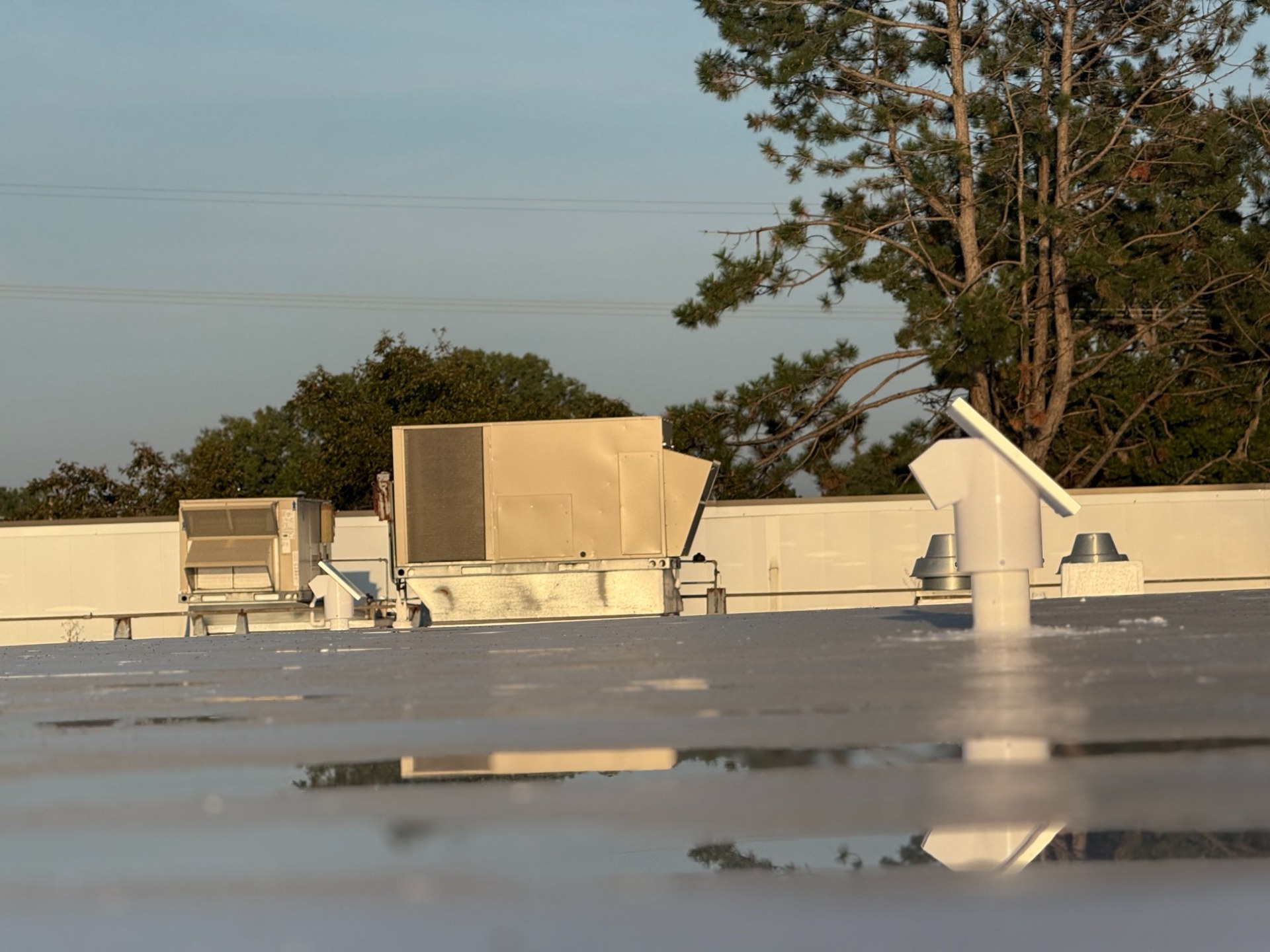 Commercial rooftop with HVAC systems showing typical roof environment