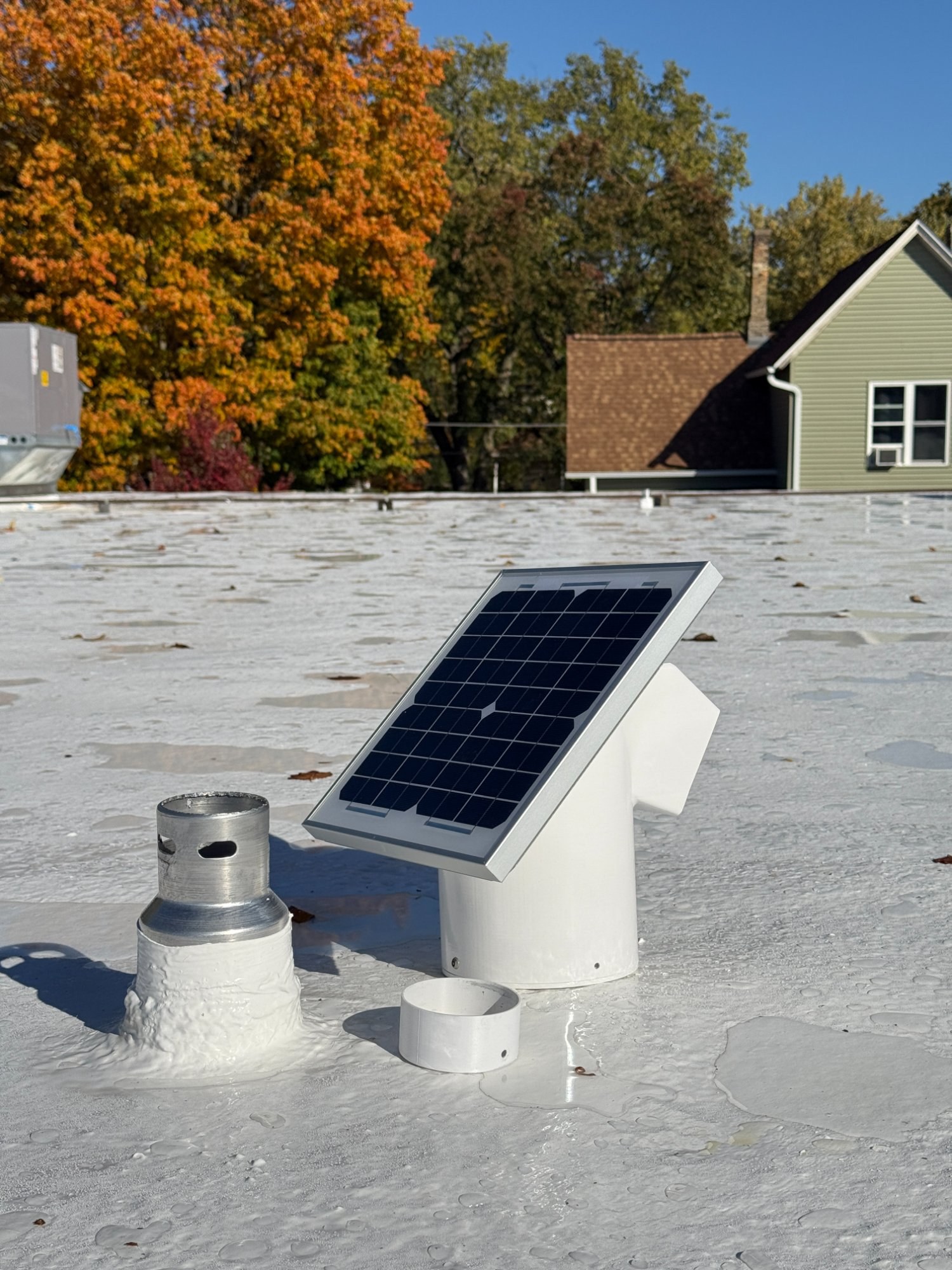 Close-up of ReDry two-way vent showing solar panel and housing